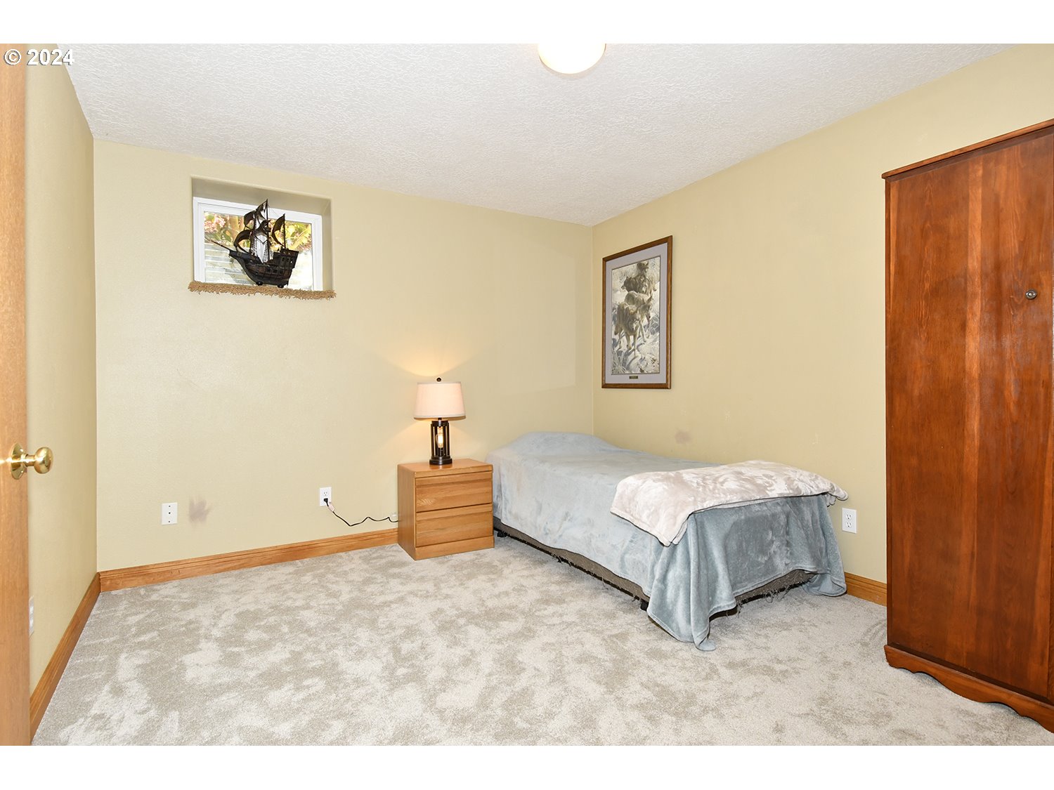 31955 Southeast Compton Road Boring, OR 97009 - Photo 18 of 48 a room with a bed and a painting on the wall