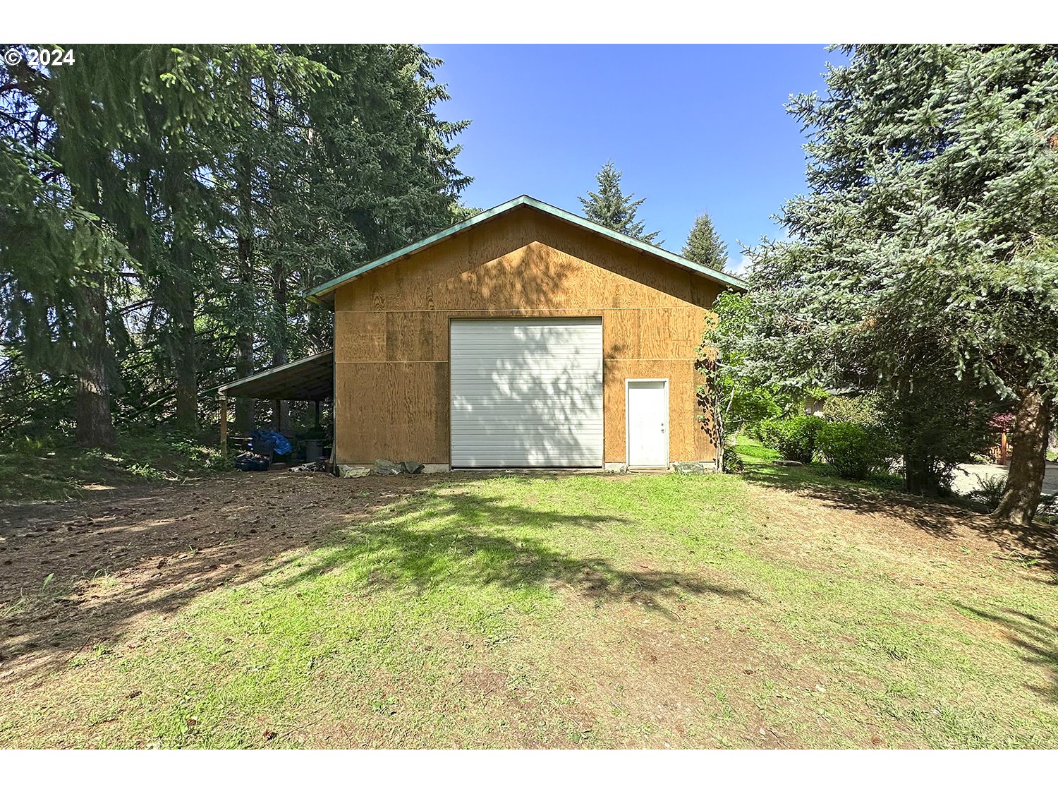 31955 Southeast Compton Road Boring, OR 97009 - Photo 28 of 48 a view of a tiny house with a yard and large trees