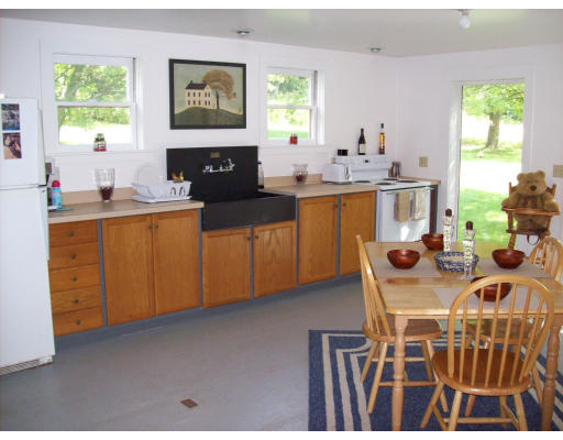32 North Farms Road Williamsburg, MA 01039 - Photo 3 of 12 a view of a dining room with furniture window and outside view