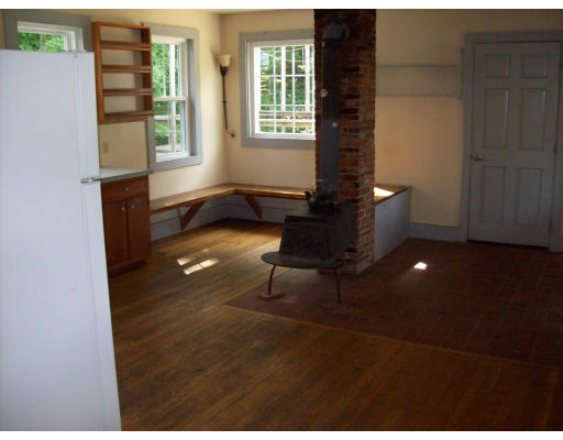 32 North Farms Road Williamsburg, MA 01039 - Photo 8 of 12 a living room with furniture and a window