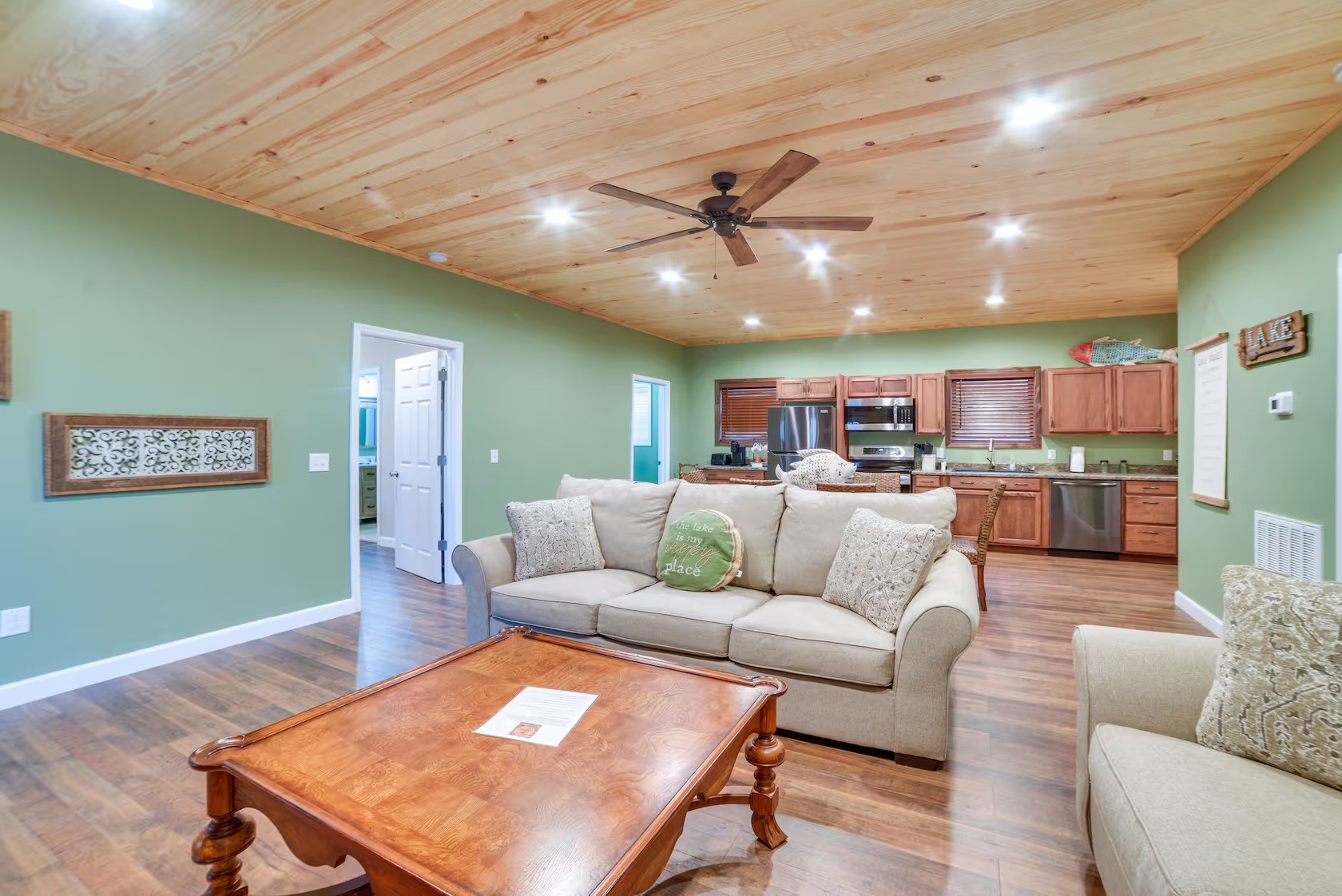 3010 Highwater Road Waverly, TN 37185 - Photo 7 of 29 a living room with furniture kitchen view and a wooden floor