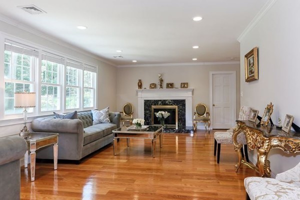 21 Chiltern Road Weston, MA 02493 - Photo 4 of 27 a living room with furniture and a fireplace