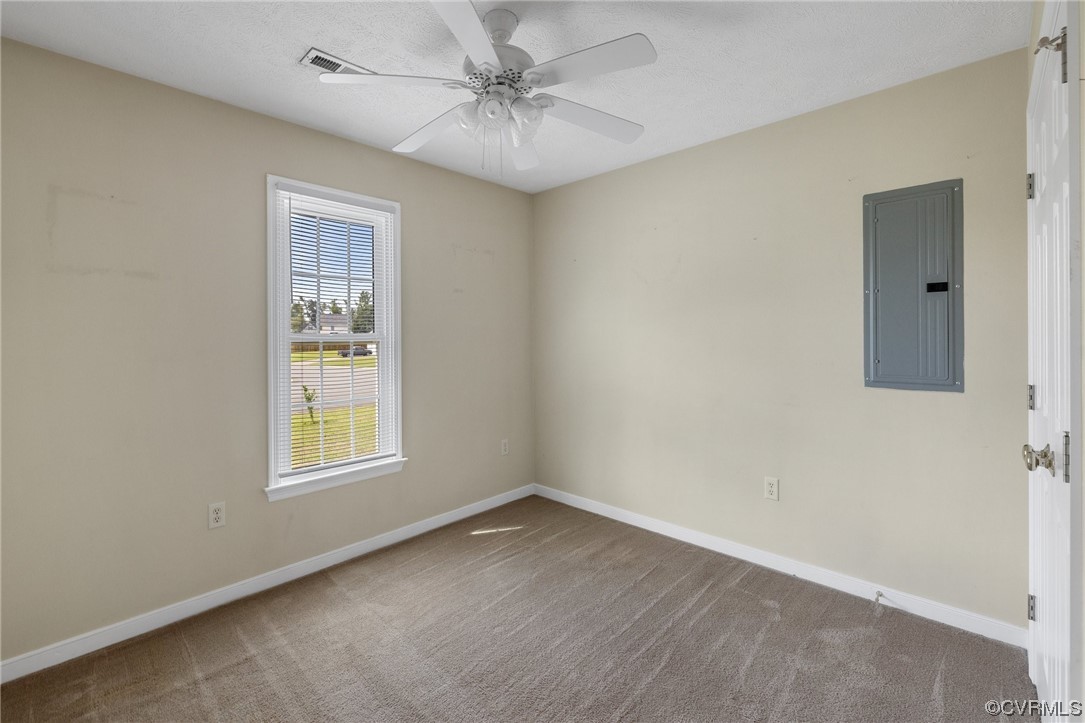 122 Pollard Place Aylett, VA 23009 - Photo 16 of 24 an empty room with windows and fan