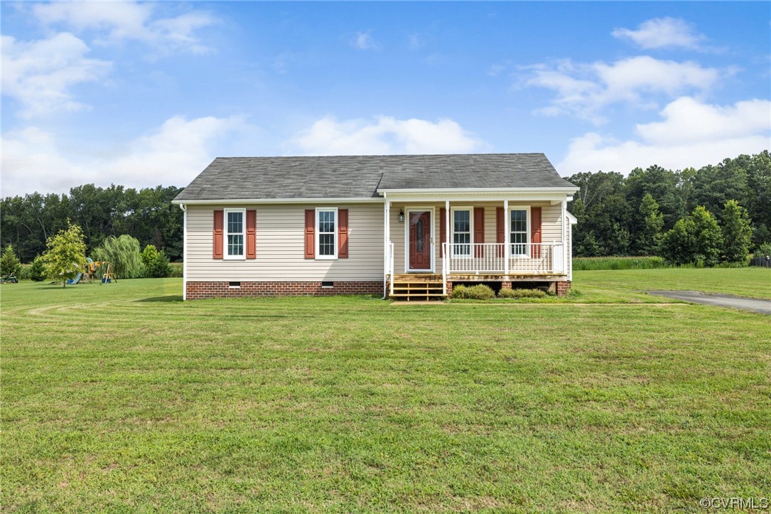 122 Pollard Place Aylett, VA 23009 - Photo 2 of 24 a front view of house with yard and green space