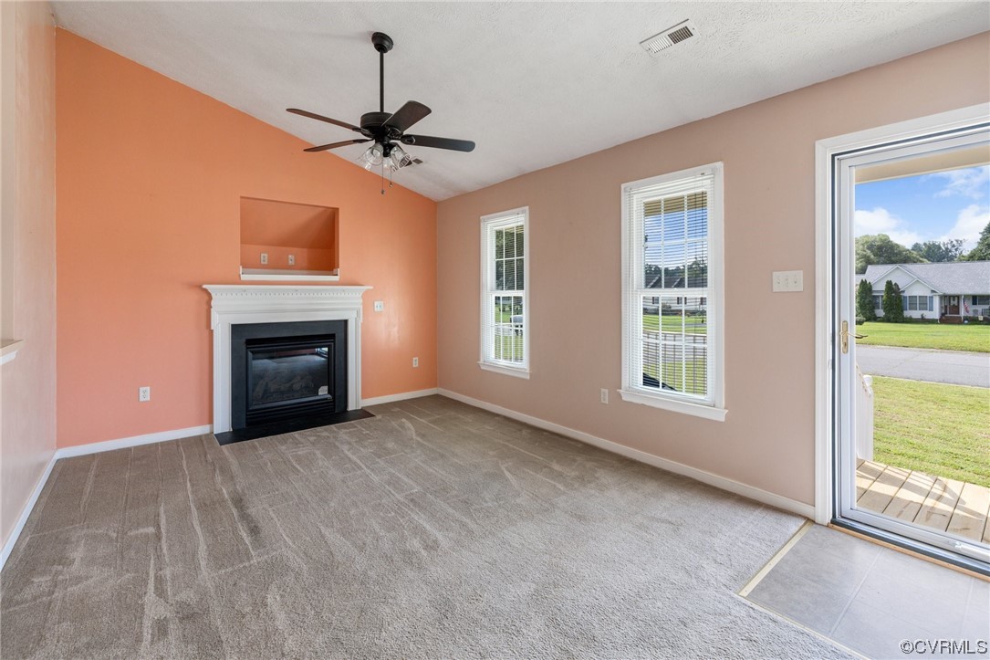 122 Pollard Place Aylett, VA 23009 - Photo 5 of 24 a view of empty room with a fireplace and fan