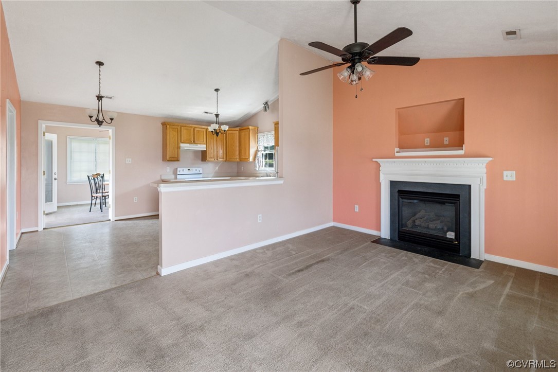 122 Pollard Place Aylett, VA 23009 - Photo 6 of 24 a view of a kitchen with a sink and a fireplace