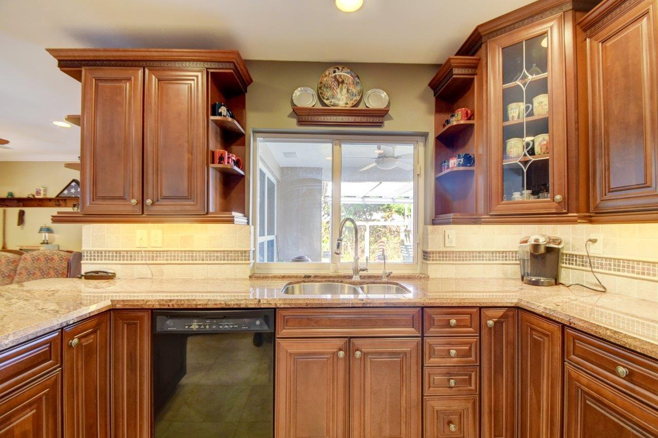 611 Northwest 16th Avenue Boca Raton, FL 33486 - Photo 14 of 45 Nice view of patio from kitchen sink