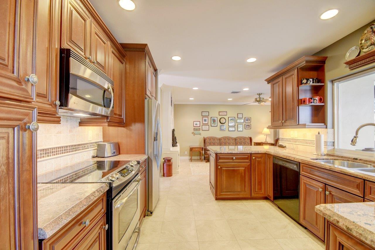 611 Northwest 16th Avenue Boca Raton, FL 33486 - Photo 16 of 45 Converse with your guests while you cook