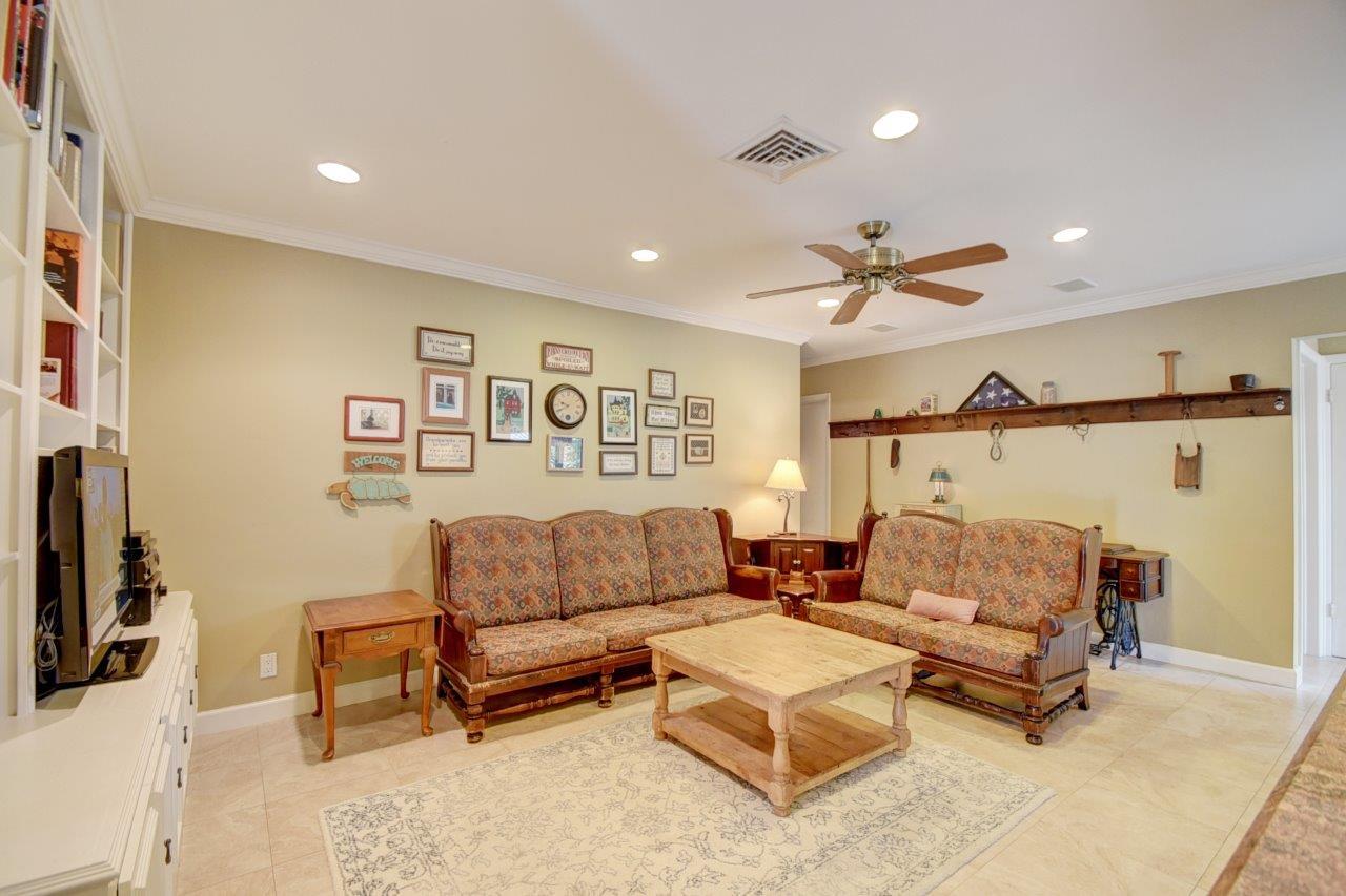 611 Northwest 16th Avenue Boca Raton, FL 33486 - Photo 18 of 45 Crown molding and porcelain tiles