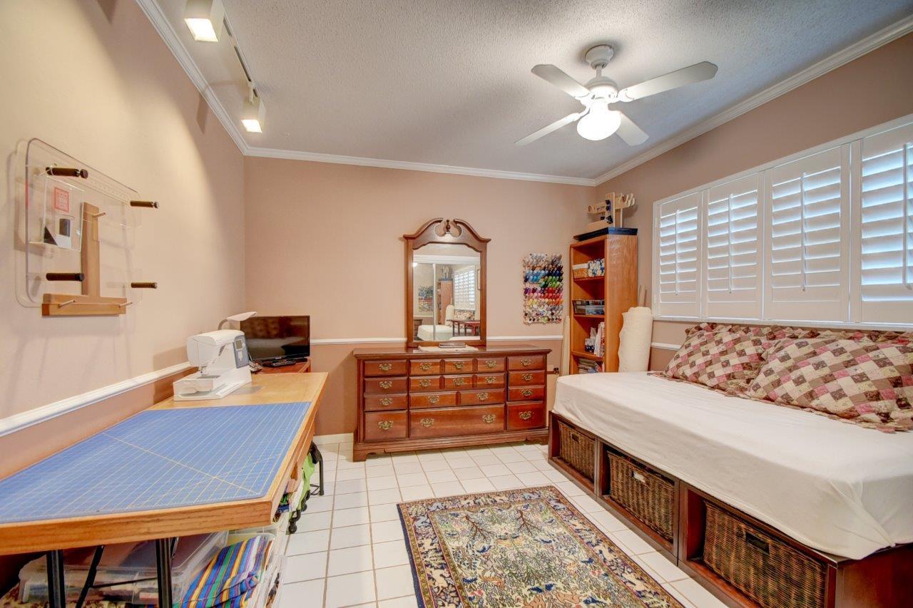 611 Northwest 16th Avenue Boca Raton, FL 33486 - Photo 27 of 45 Bedroom 3 with tile floors and plantatio