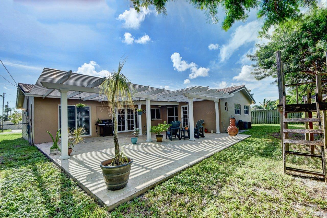 611 Northwest 16th Avenue Boca Raton, FL 33486 - Photo 33 of 45 Relax its impact glass