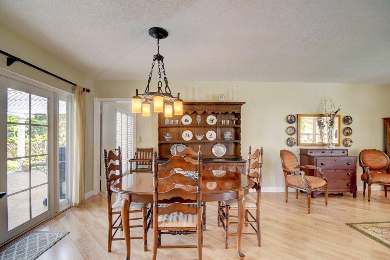 611 Northwest 16th Avenue Boca Raton, FL 33486 - Photo 10 of 45 Dining room w/ french doors to patio