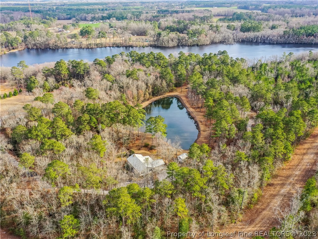 2947 Smith Mill Road Lumberton, NC 28358 - Photo 1 of 50 a view of a lake with outdoor space