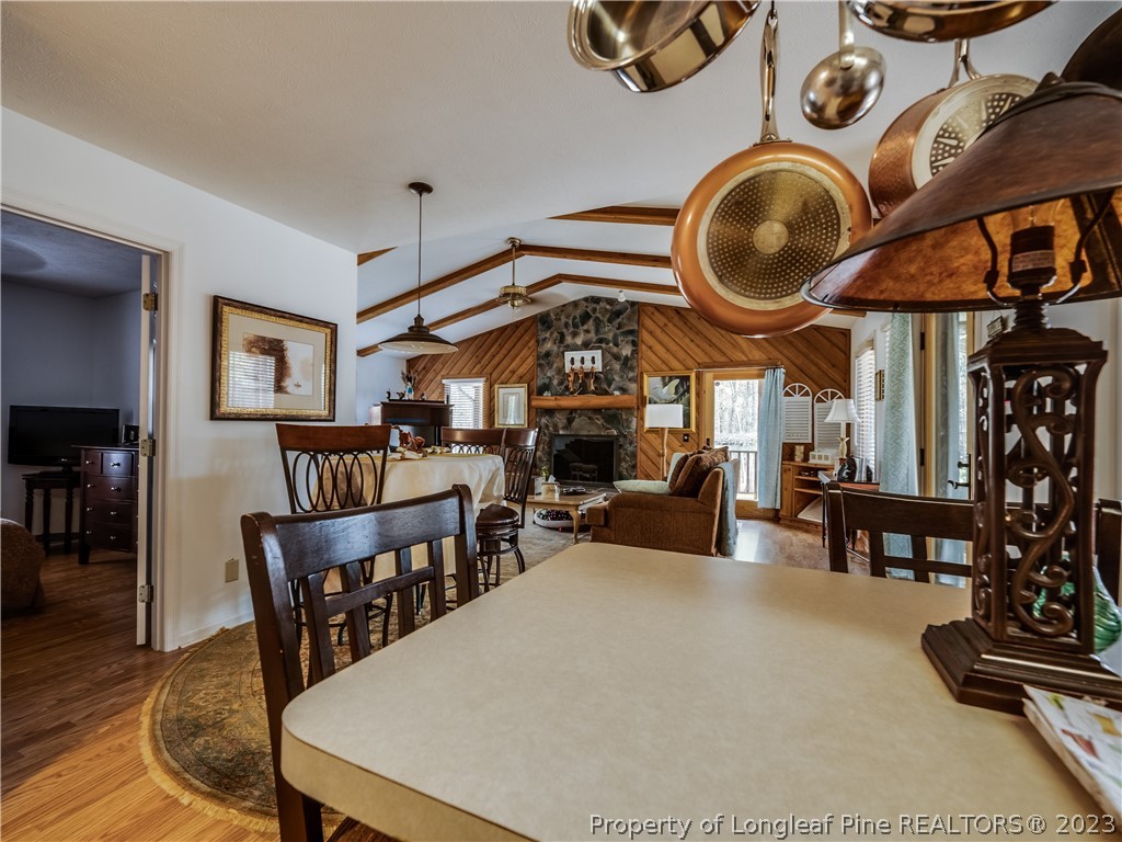 2947 Smith Mill Road Lumberton, NC 28358 - Photo 14 of 50 a view of a livingroom with furniture and a wooden floor
