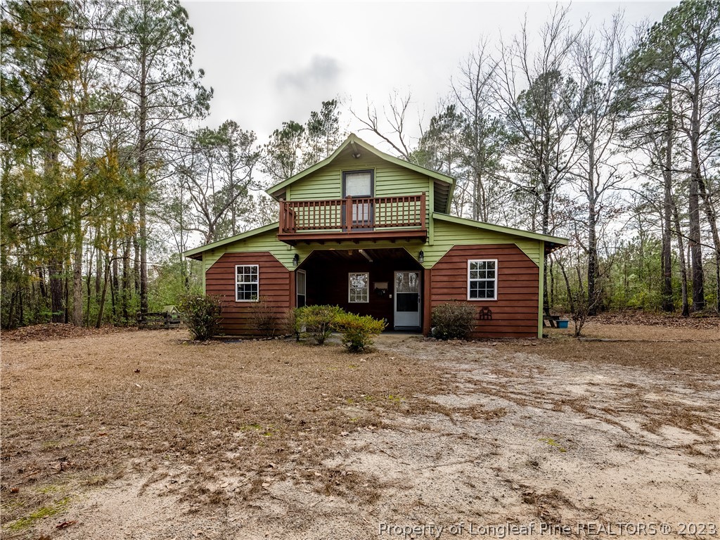 2947 Smith Mill Road Lumberton, NC 28358 - Photo 43 of 50 a view of a house with a yard