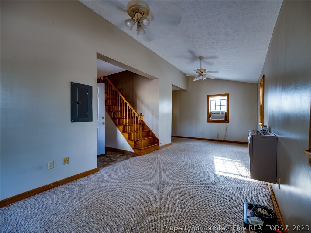 2947 Smith Mill Road Lumberton, NC 28358 - Photo 46 of 50 a view of a livingroom with a staircase