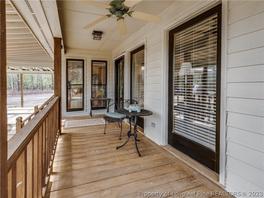 2947 Smith Mill Road Lumberton, NC 28358 - Photo 5 of 50 a view of a patio with wooden floor and outdoor space