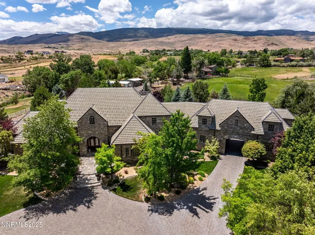 an aerial view of a house with a garden