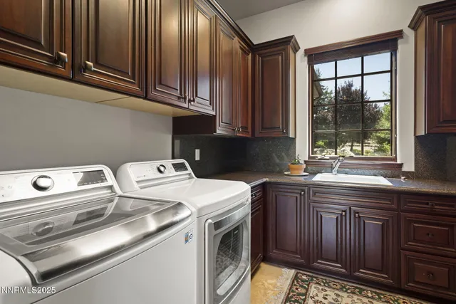 a view of a dining room with furniture and window