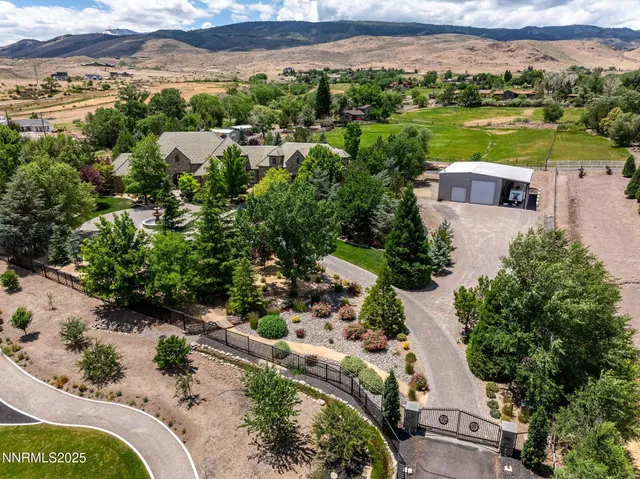 an aerial view of a house with a garden