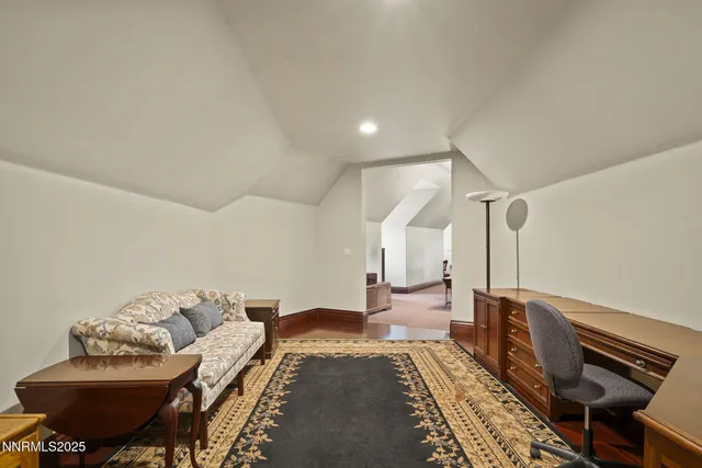 a view of a house with backyard porch and sitting area