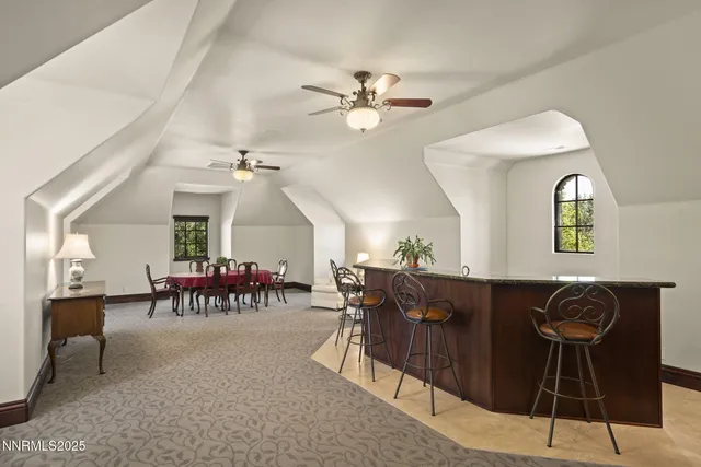a view of a backyard with plants and a patio