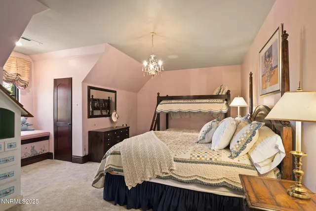 a view of a patio with table and chairs and potted plants