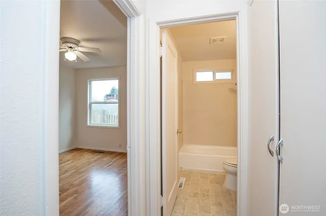 a view of a bathroom with a glass door