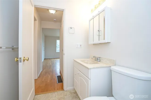 a bathroom with a sink and a toilet