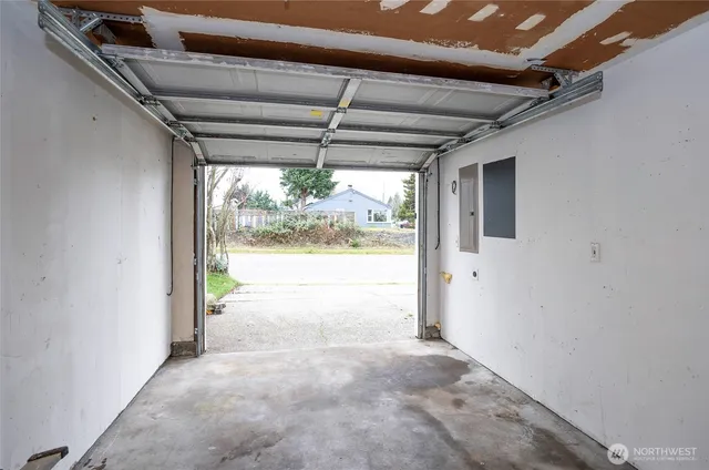 a view of a room with a large window