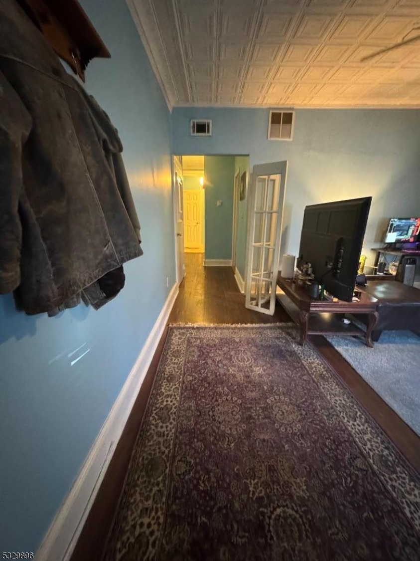 107 Mechanic Street, Unit 9 Boonton, NJ 07005 - Photo 2 of 12 a view of a room with gym equipment