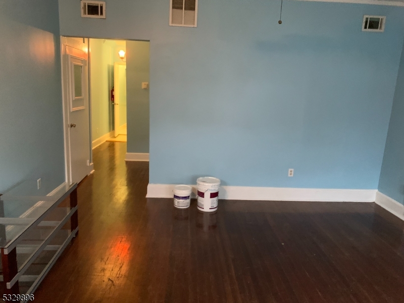 107 Mechanic Street, Unit 9 Boonton, NJ 07005 - Photo 4 of 12 a view of an empty room and window