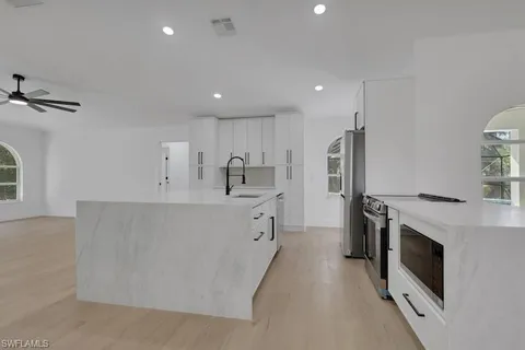 $785,000 | 440 33rd Avenue Northeast, Naples, FL 34120