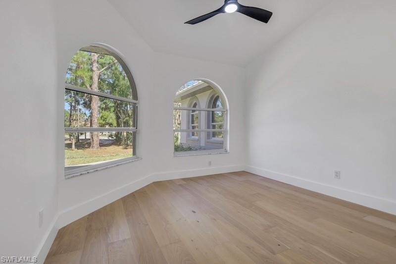 440 33rd Avenue Northeast Naples, FL 34120 - Photo 13 of 34 an empty room with windows and outdoor view