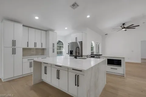 $785,000 | 440 33rd Avenue Northeast, Naples, FL 34120