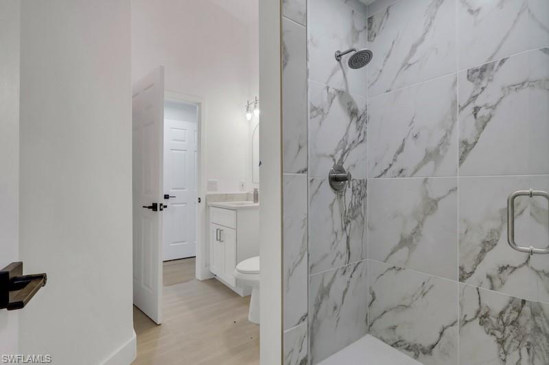 440 33rd Avenue Northeast Naples, FL 34120 - Photo 26 of 34 a bathroom with a shower