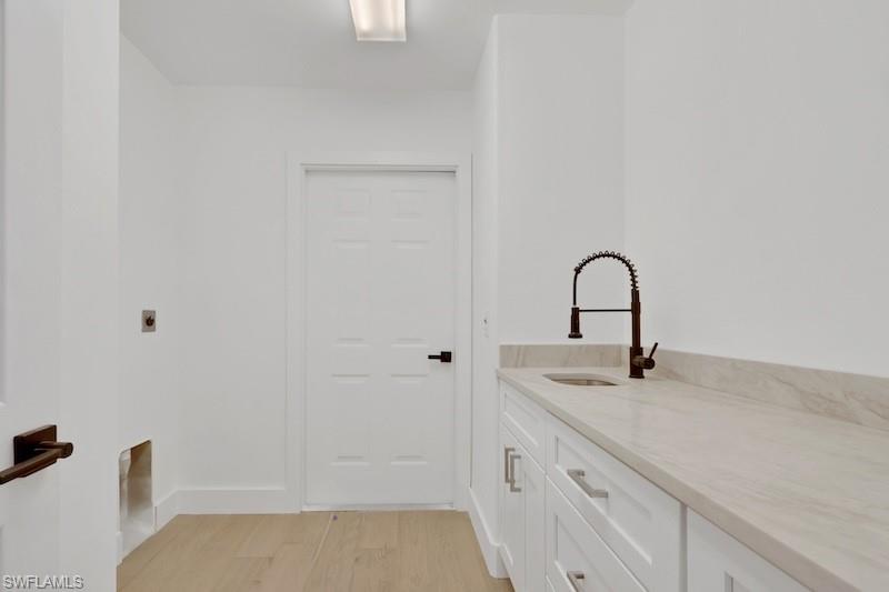 440 33rd Avenue Northeast Naples, FL 34120 - Photo 33 of 34 a close view of a sink and tap