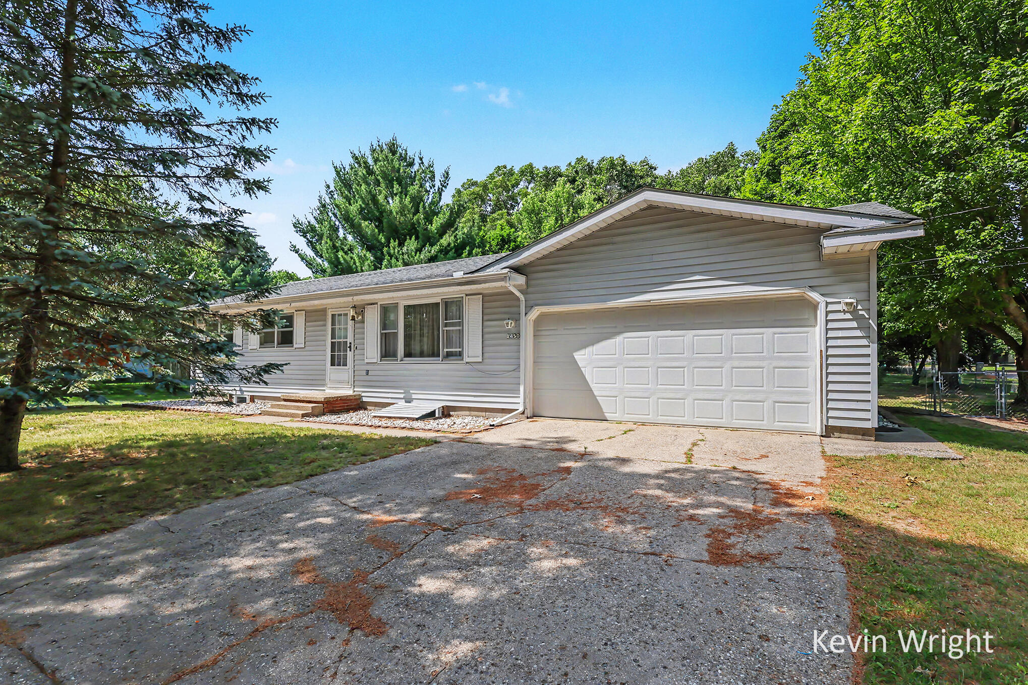 2450 Benston Road Whitehall, MI 49461 - Photo 1 of 28 QJ1A0939