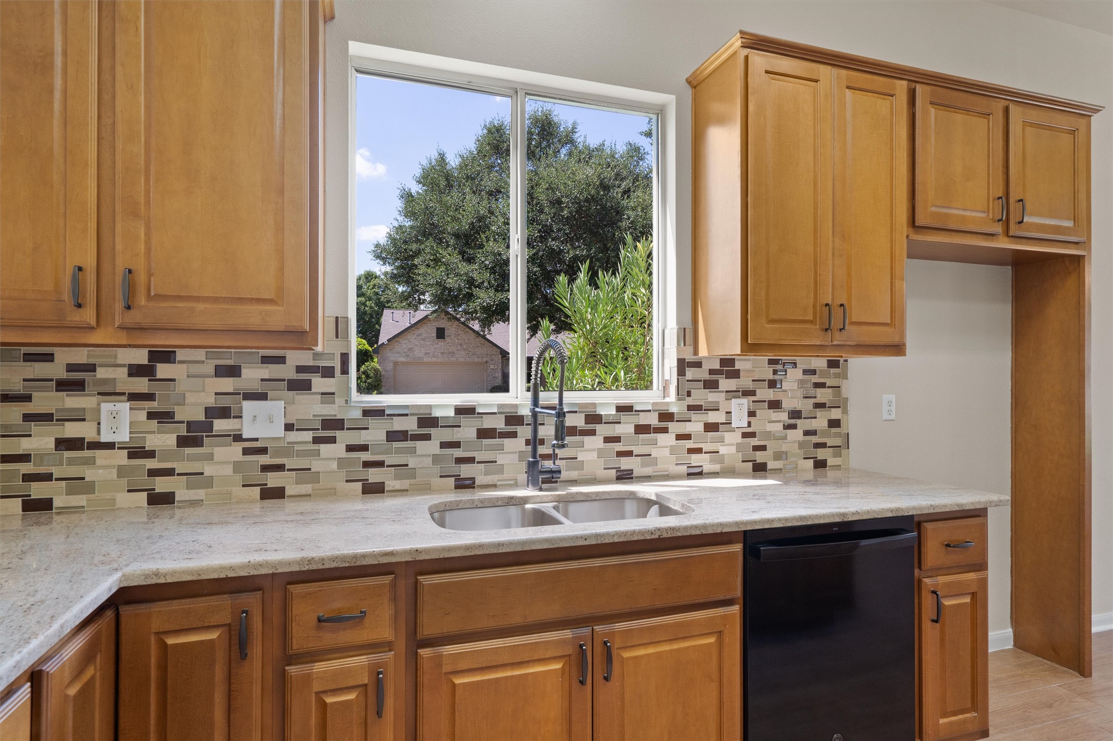 108 Cattle Trail Way Georgetown, TX 78633 - Photo 11 of 40 Window over kitchen sink to enjoy.