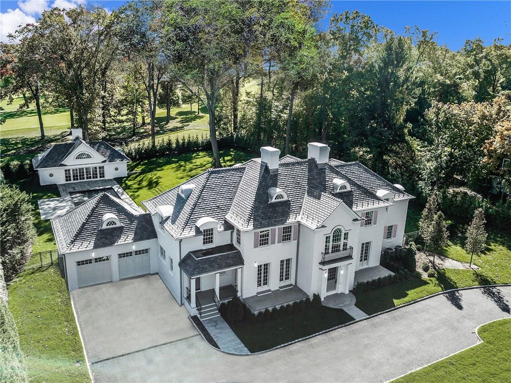 72 Sheldrake Road Scarsdale, NY 10583 - Photo 1 of 1 a view of a house with a yard and sitting area