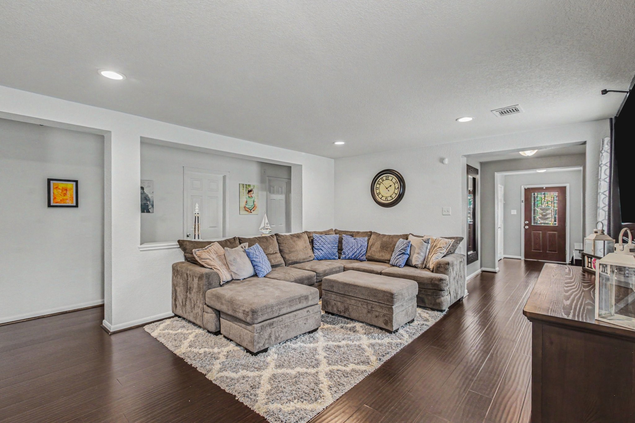 2903 Swift Brook Glen Way Spring, TX 77389 - Photo 7 of 30 Inviting living room also features an open layout and recessed lighting.