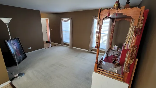 a room with furniture and a mirror