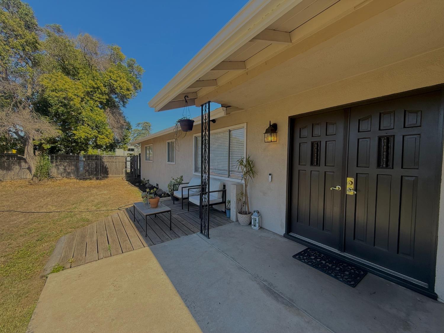 1636 Cameo Way Modesto, CA 95350 - Photo 3 of 29 a view of a house with backyard and sitting area
