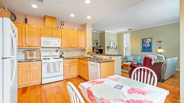 a very nice looking kitchen with a large window