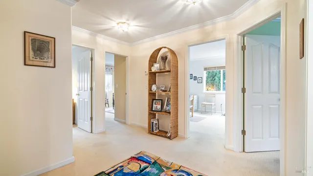 a bed room with a bed and a chair