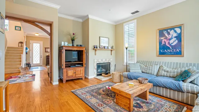 a living room with furniture or couch and a window