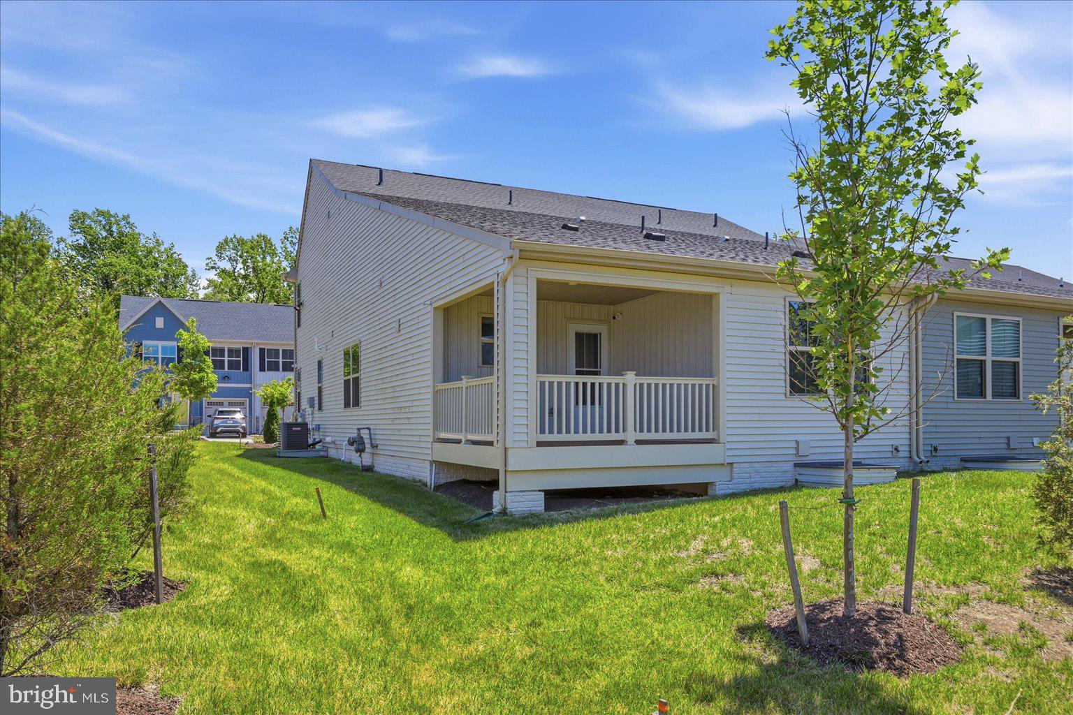 14380 Longhouse Loop Brandywine, MD 20613 - Photo 17 of 20 a view of a house with a yard