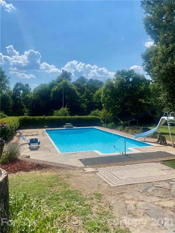 2490 Pinckney Road Chester, SC 29706 - Photo 4 of 47 a view of a swimming pool with a yard