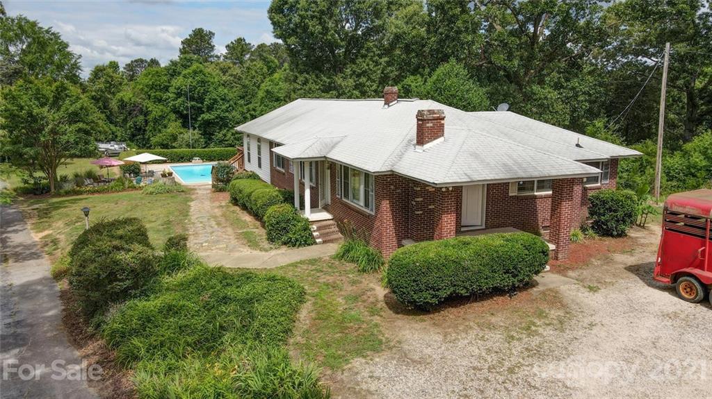2490 Pinckney Road Chester, SC 29706 - Photo 8 of 47 a aerial view of a house with a yard table and chairs