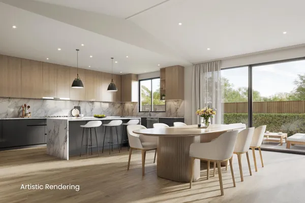 a kitchen with a table and chairs